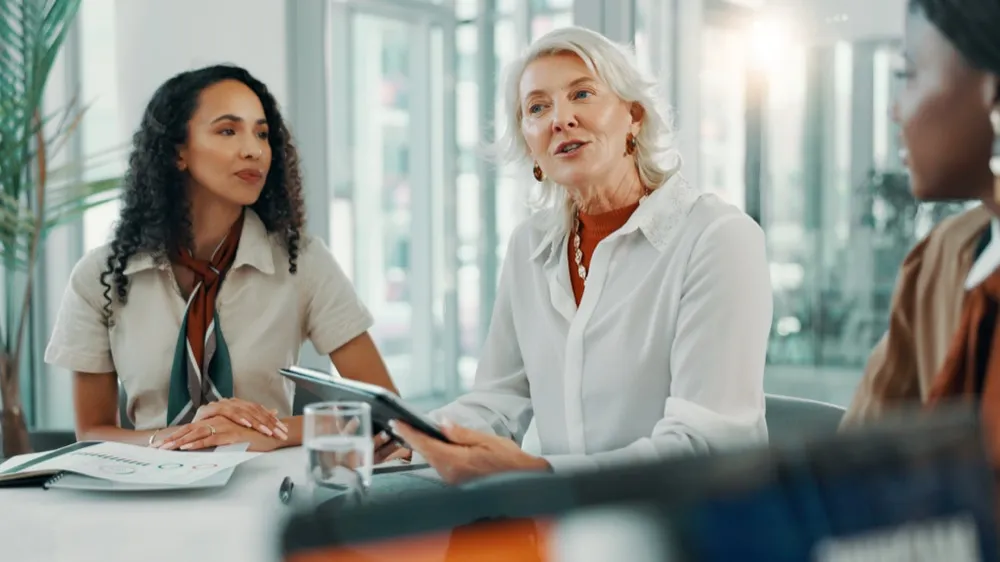 boardroom-meeting-and-tablet-with-business-women-2026-01-09-09-17-05-utc